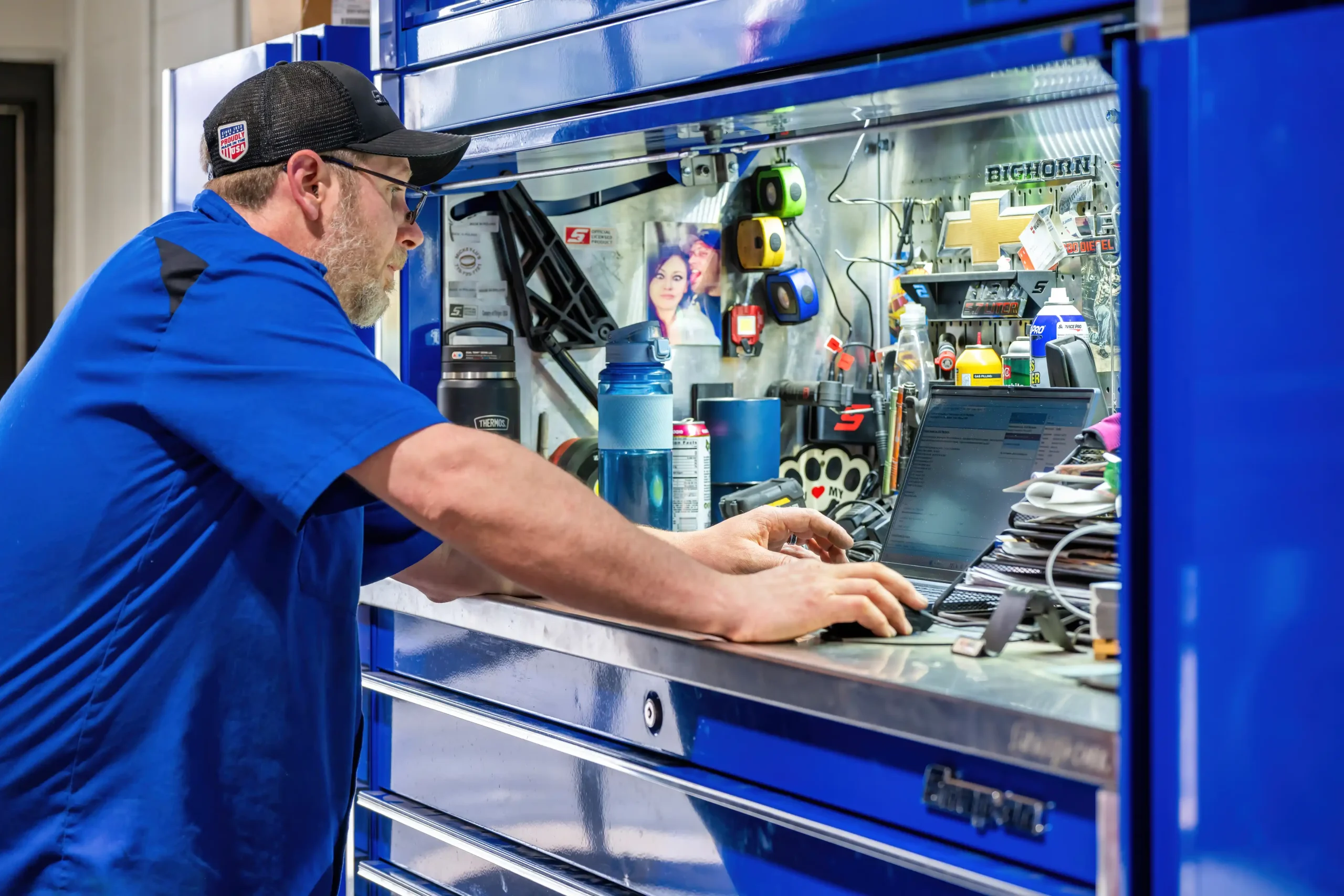 Huron Automotive technician running engine diagnostics
